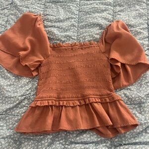 orange top so flattering !!